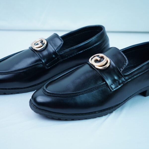 Gucci Buckle Tassel Loafer